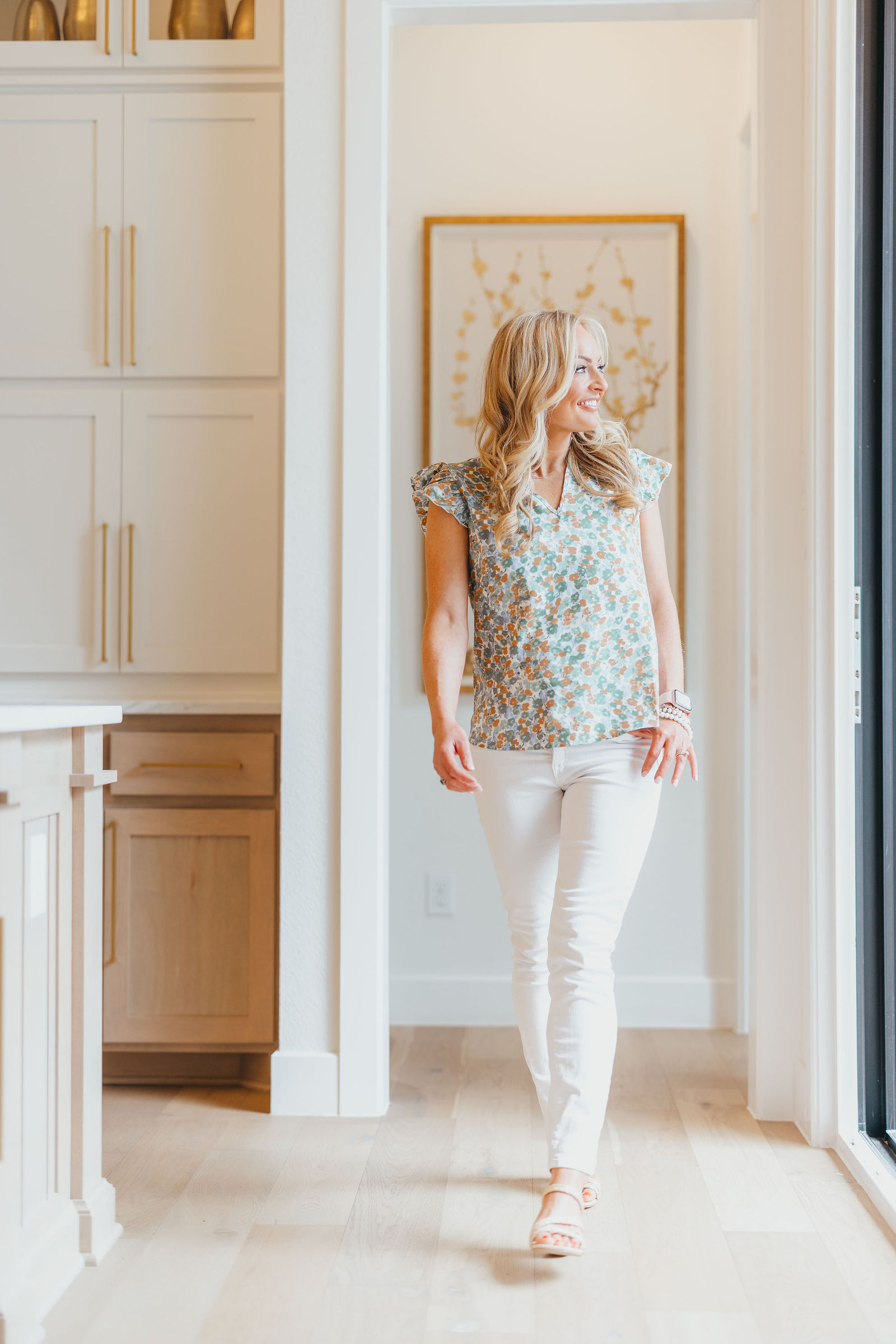 Kaitlin Lovern, founder of the Kaitlin Lovern Real Estate Team, touring a new construction home in Frisco, TX