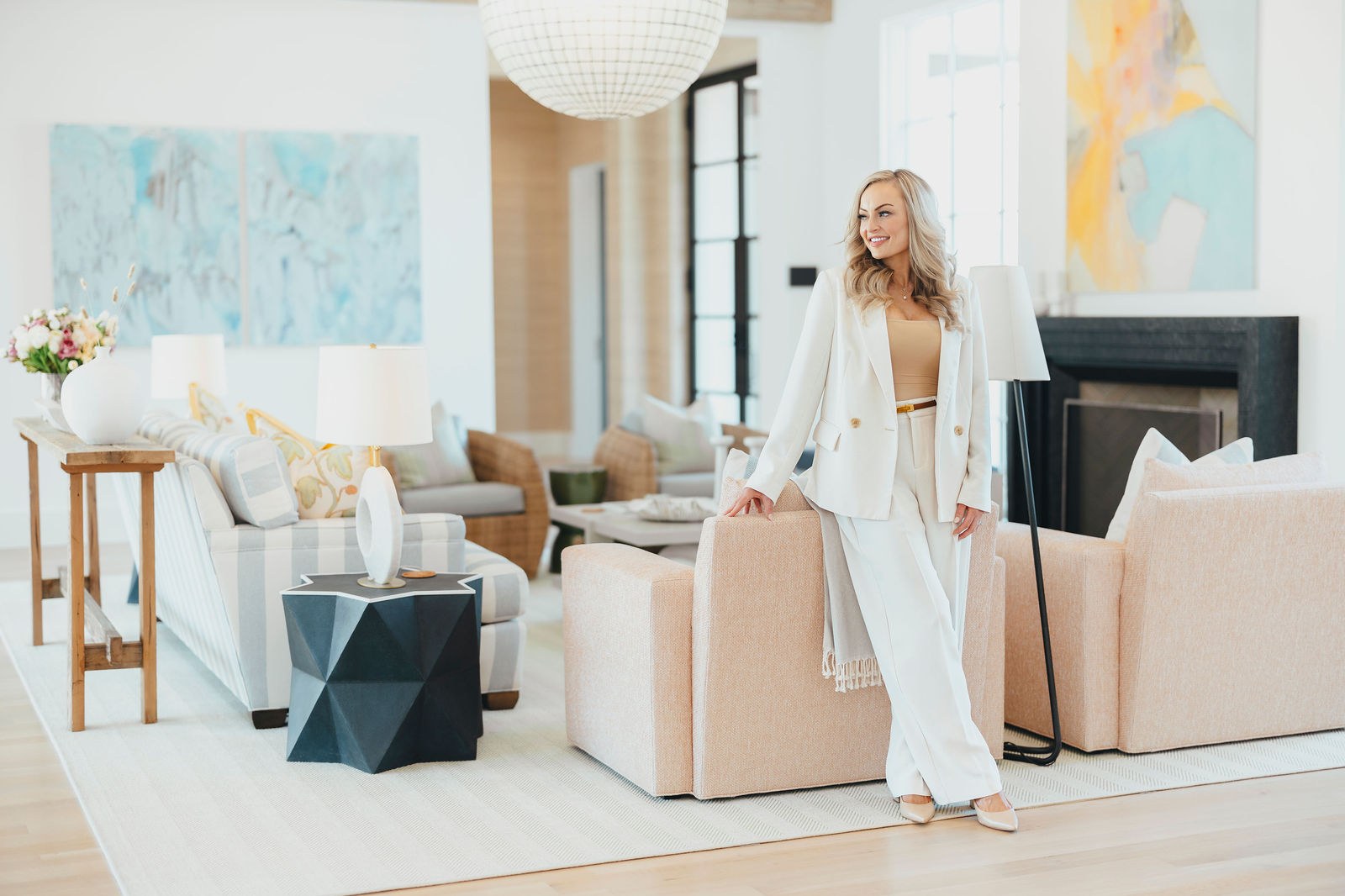 Kaitlin Lovern inside a finished North Dallas home for a new-construction versus resale comparison